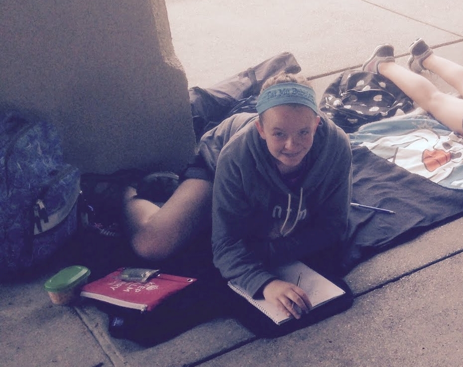 2015-06-16 Jane writing at Worlds Fair.